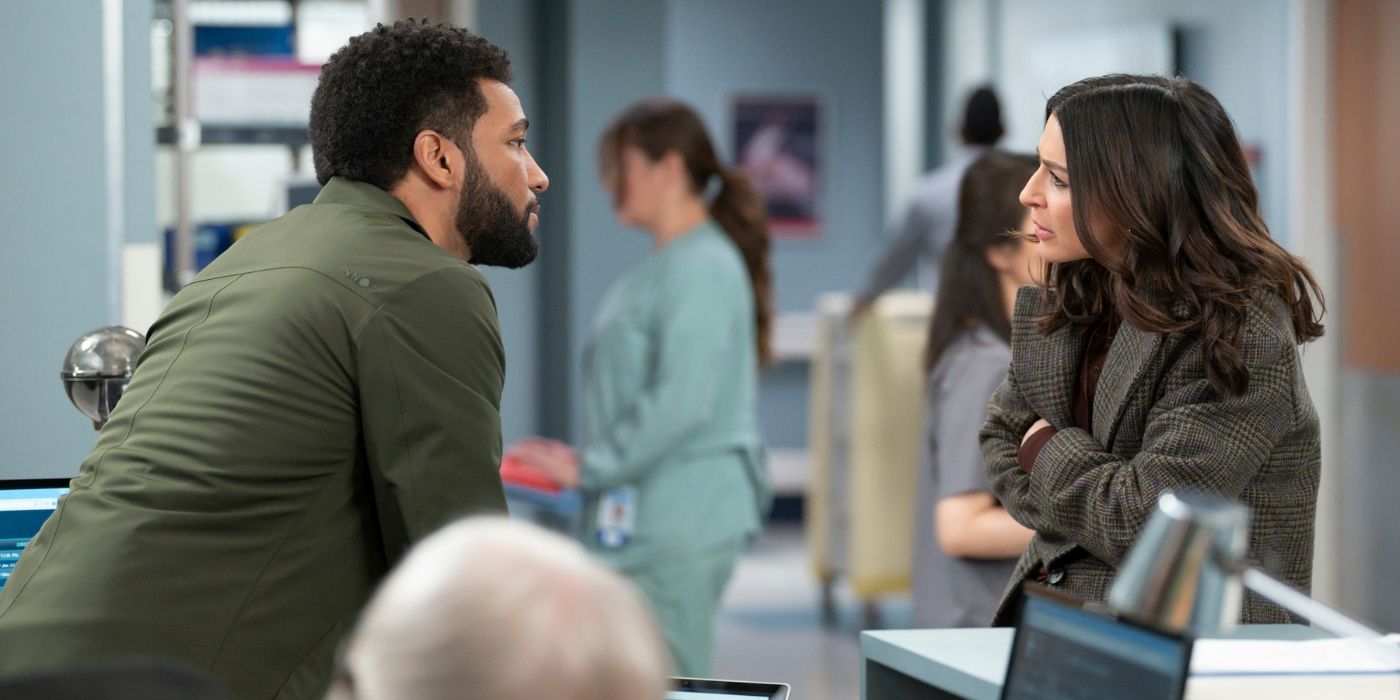 Anthony Hill as Winston Ndugu is approached by Caterina Scorsone as Amelia Shepherd on Grey's Anatomy