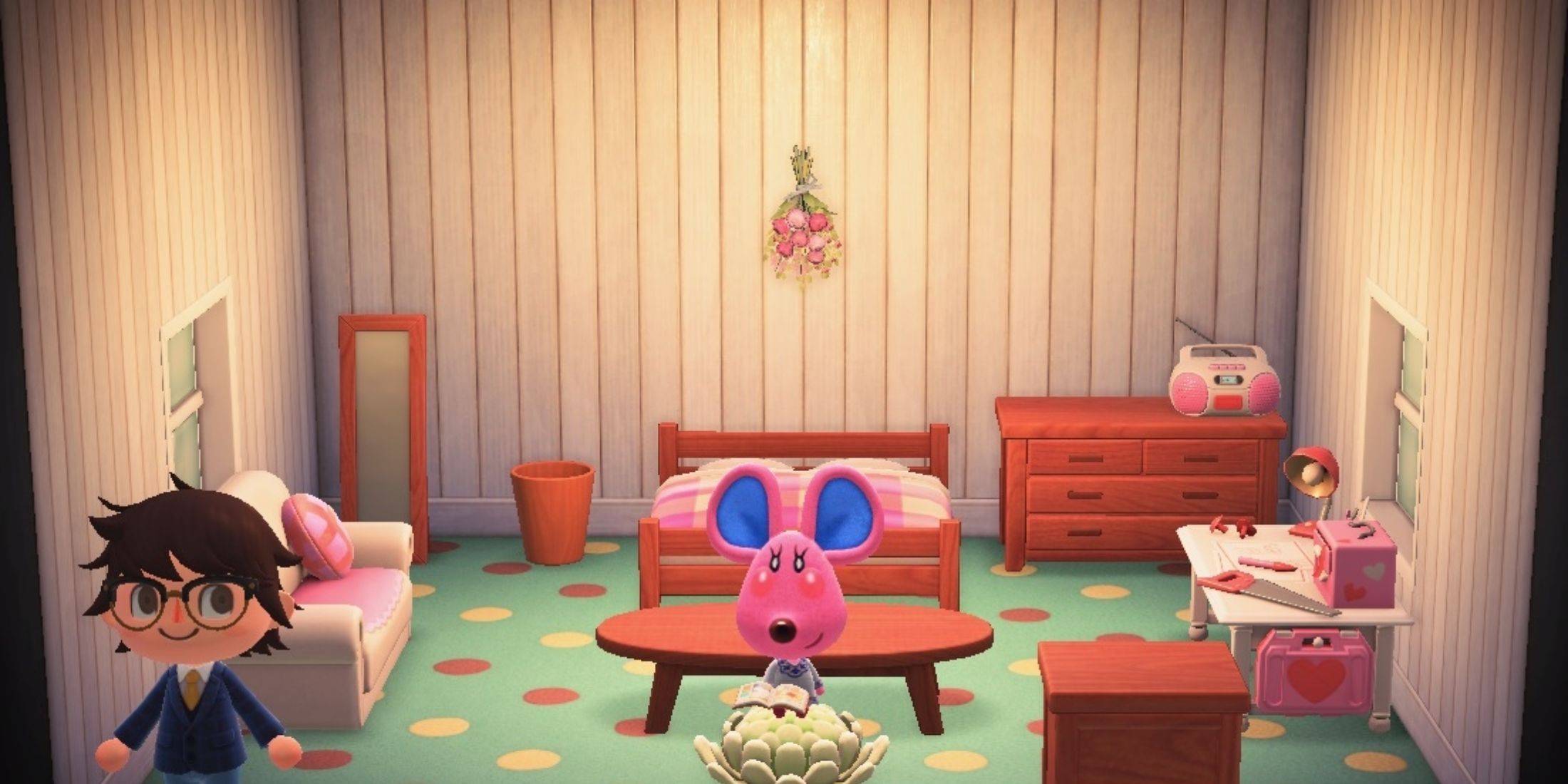 Candi sentada em uma sala em Animal Crossing New Horizons