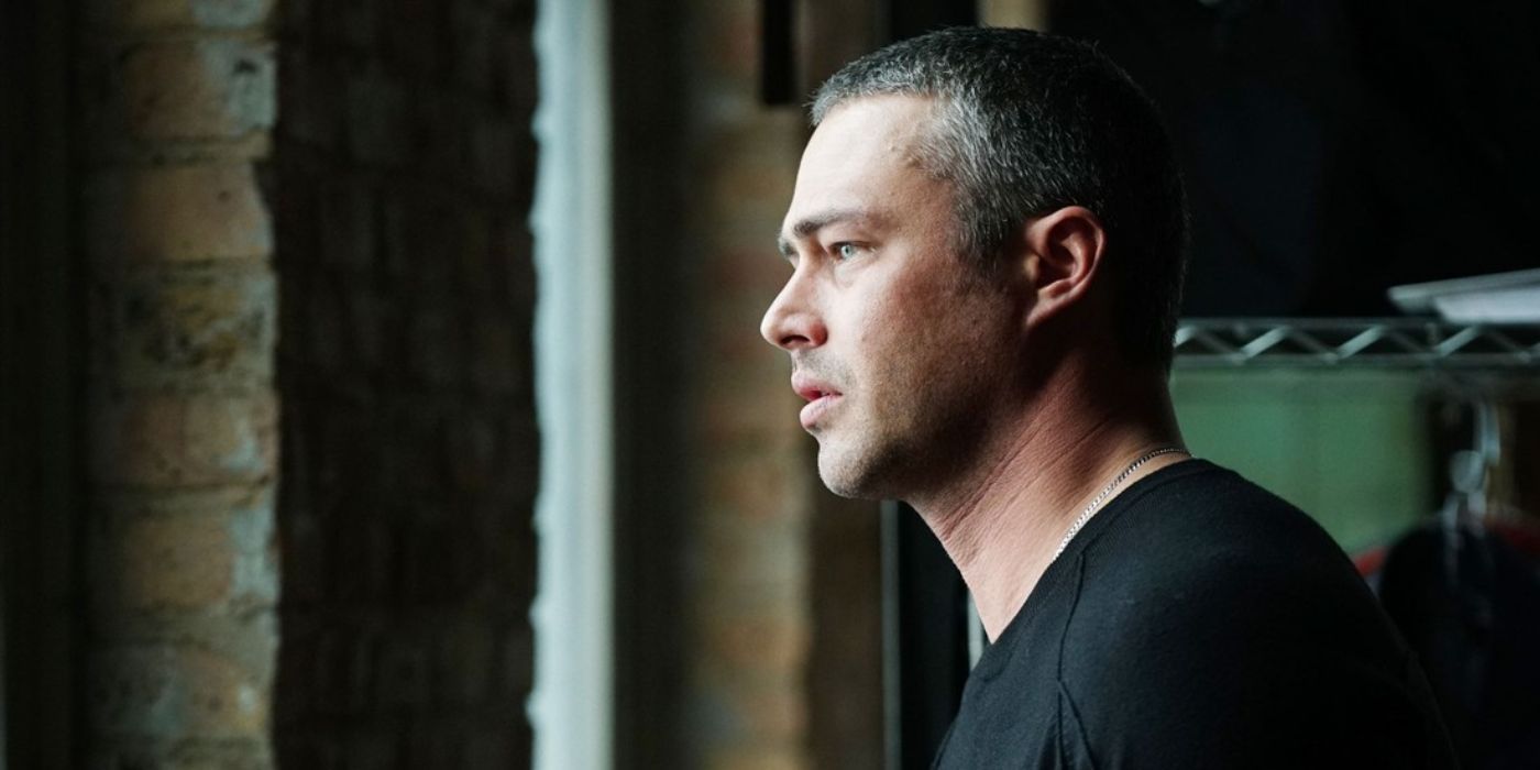 Taylor Kinney as Kelly Severide looking out a window in Chicago Fire episode "Carry Me"
