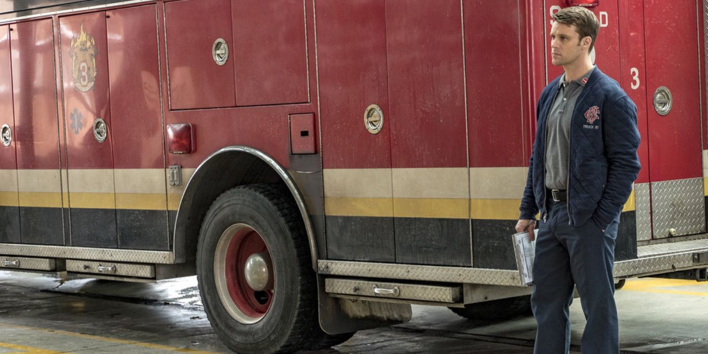 Jesse Spencer as Matthew Casey standing next to firetruck in Chicago Fire episode "Carry Me"