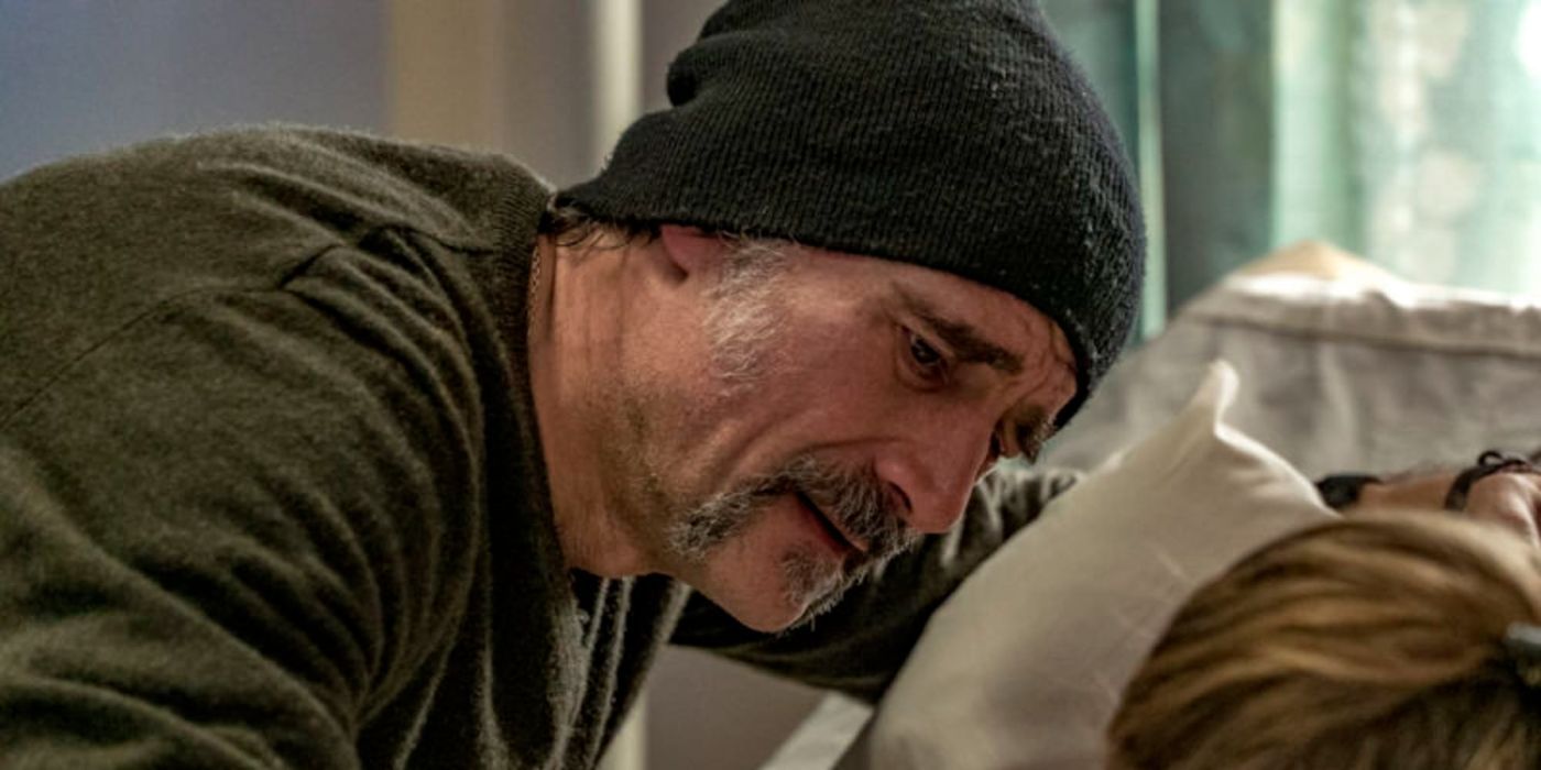 Alvin Olinsky (Elias Koteas) by his daughters hospital bed in Chicago Fire episode "Deathtrap"