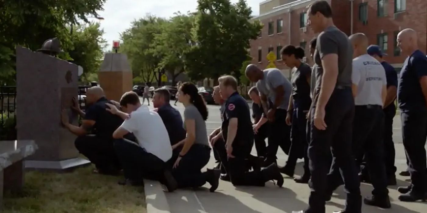 Firehouse 51 kneeling at Brian Zvonecek's memorial in Chicago Fire episode "Sacred Ground"