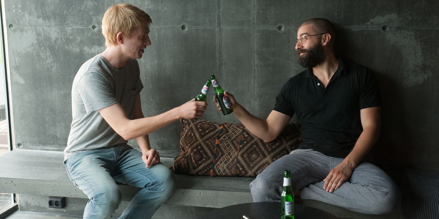 Nathan and Caleb drink beers in Ex Machina