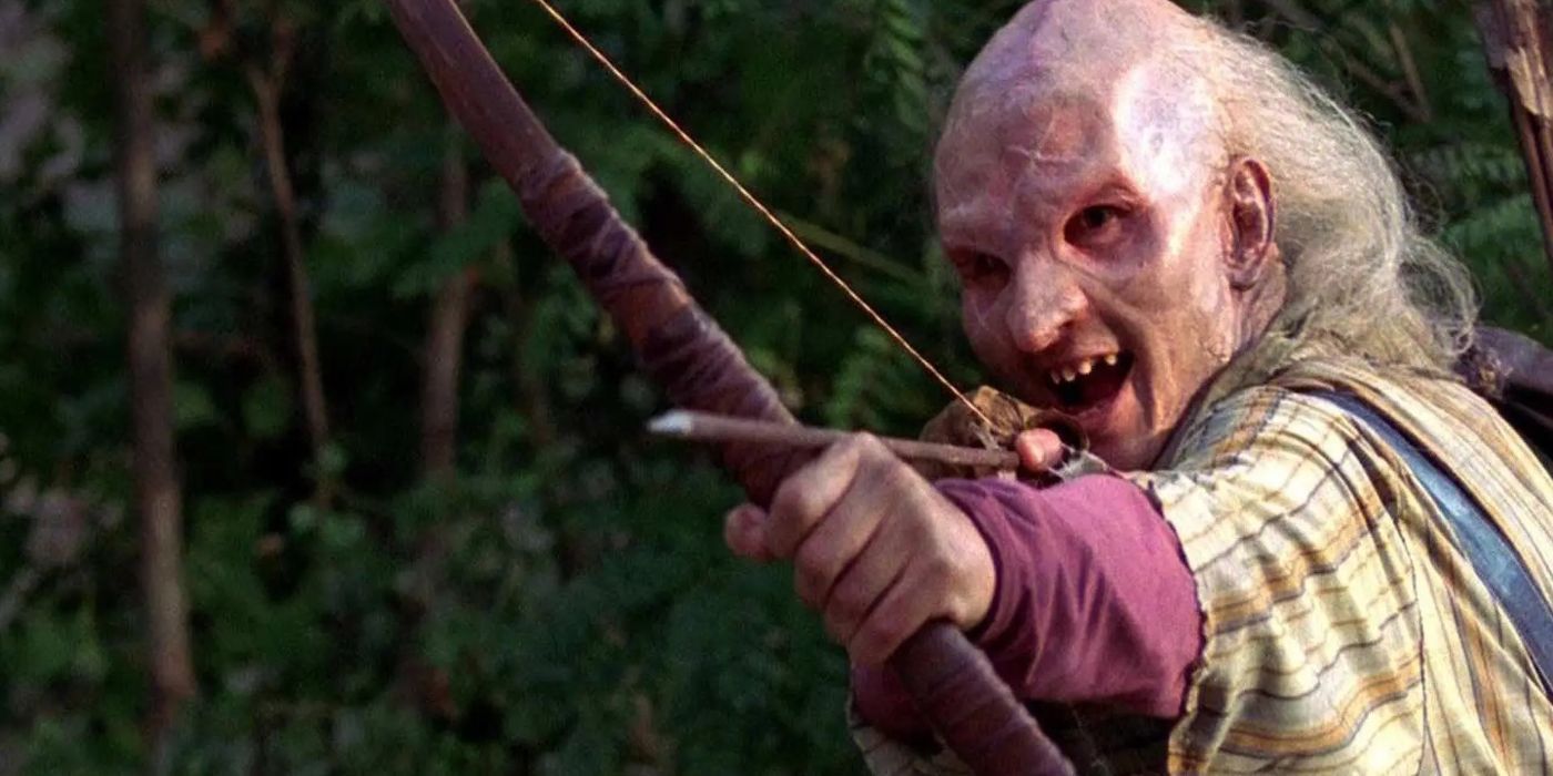 Three Finger prepared to shoot an arrow with his bow in Wrong Turn 