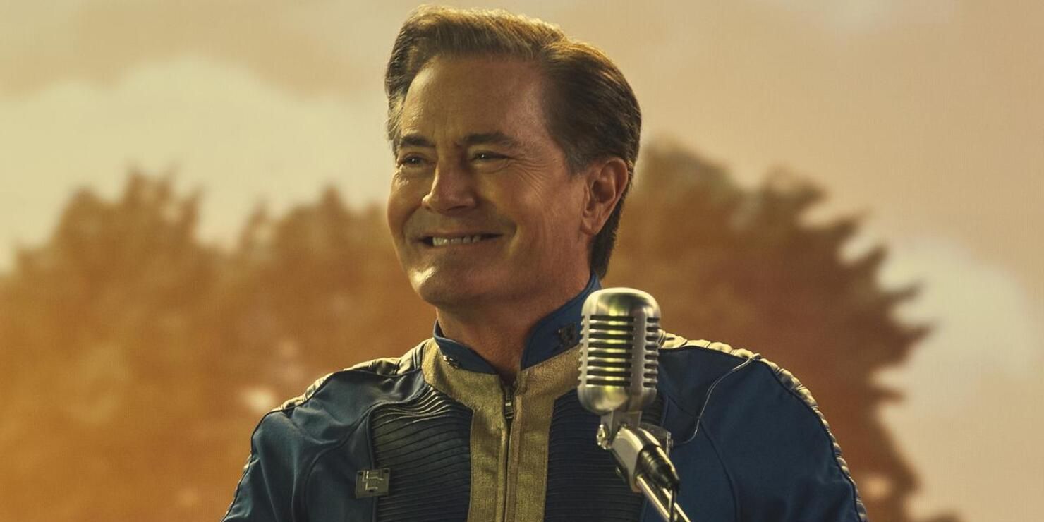 Hank MacLean (actor Kyle McLachlan) smiles in front of a microphone in Fallout