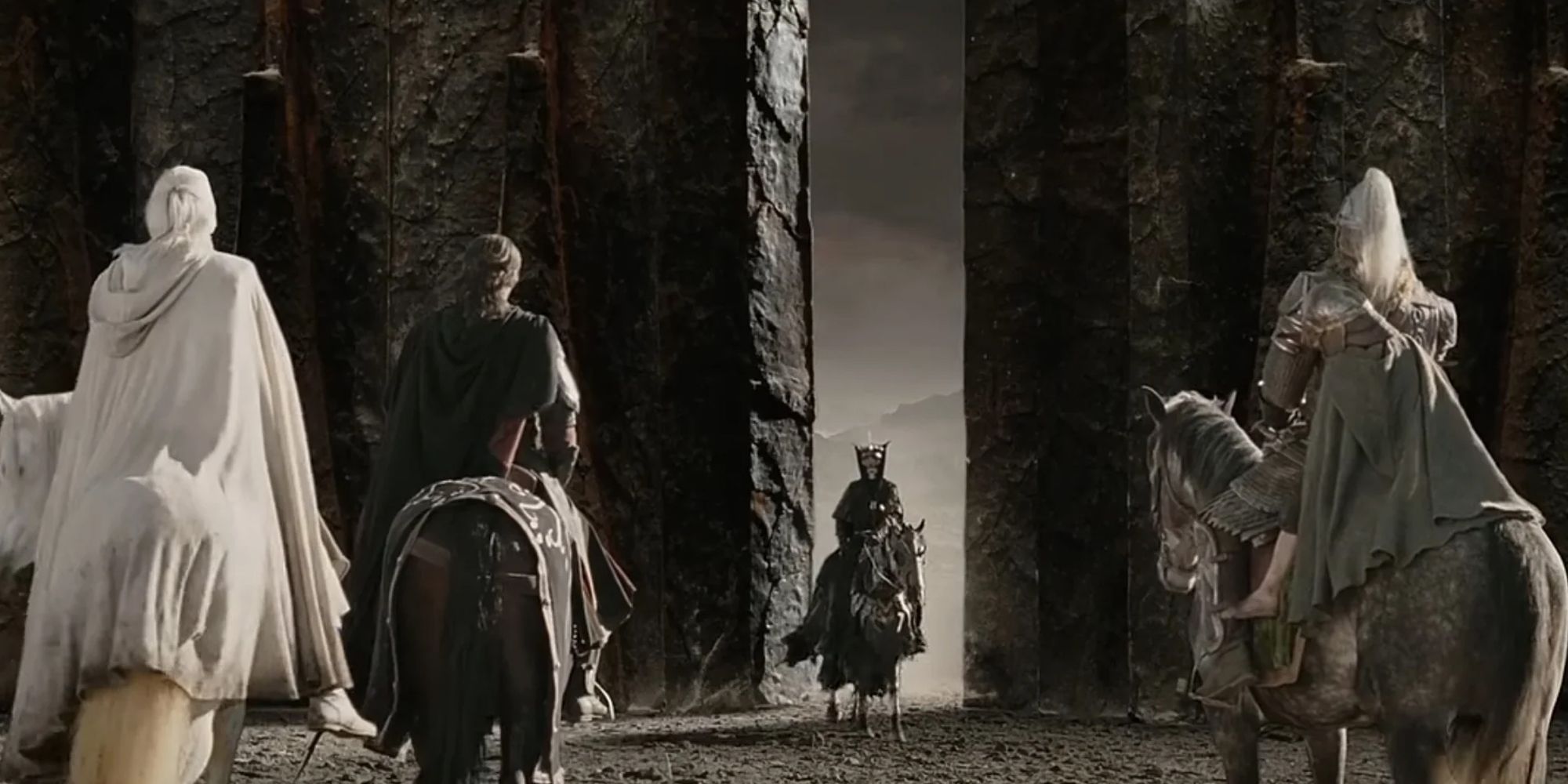 Gandalf, Aragorn, and Eomer ride out to meet the Mouth of Sauron