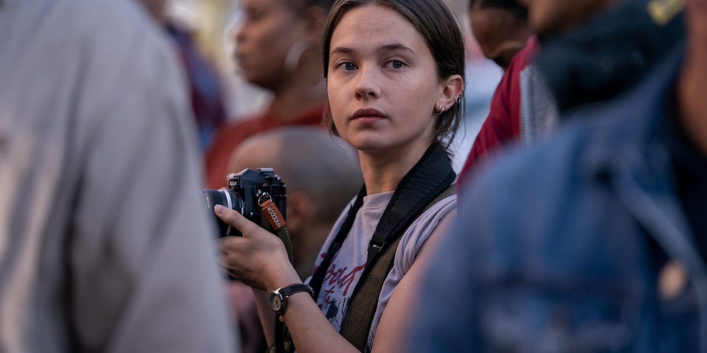 Jessie holds her camera in Civil War