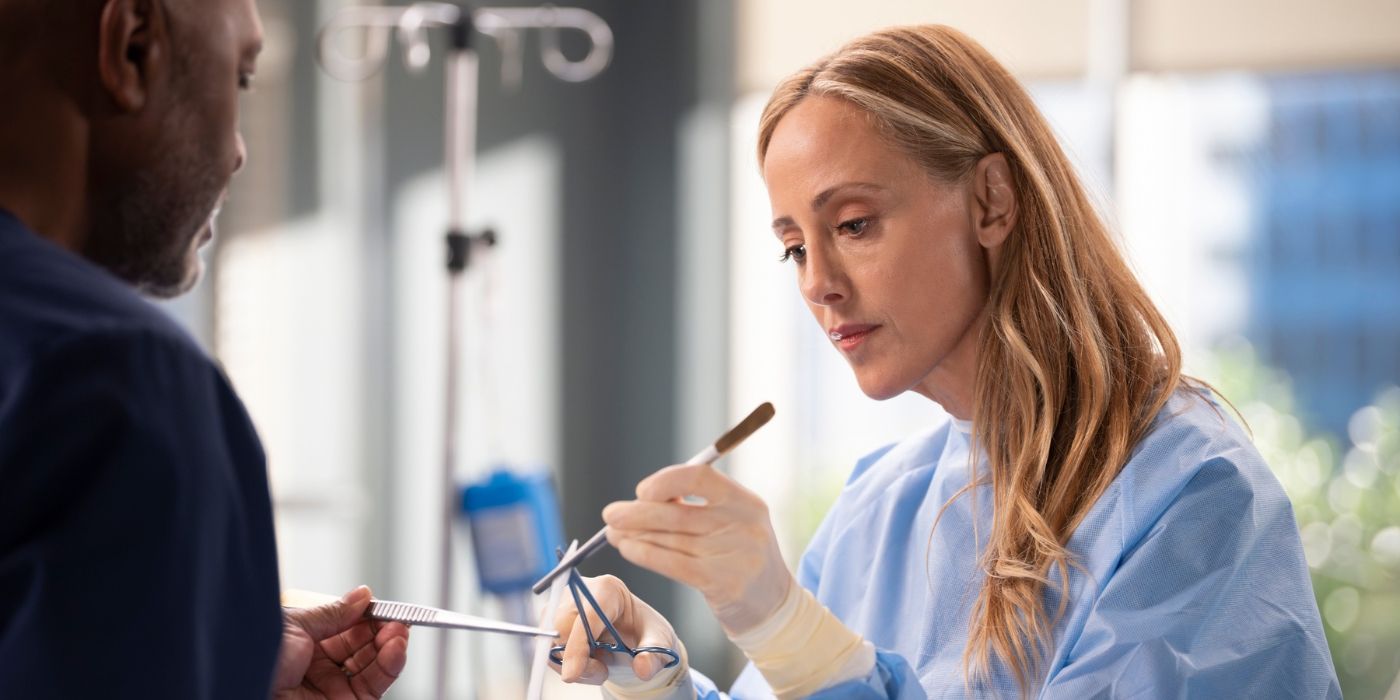 Kim Raver as Teddy Altman practices surgery across from James Pickens Jr. as Richard Webber on Grey's Anatomy
