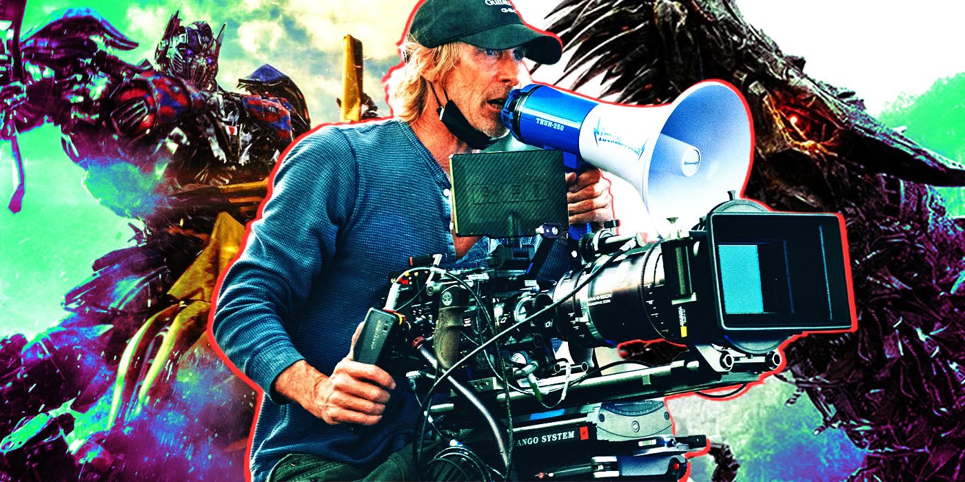 Michael Bay in front of images of his Transformers movies
