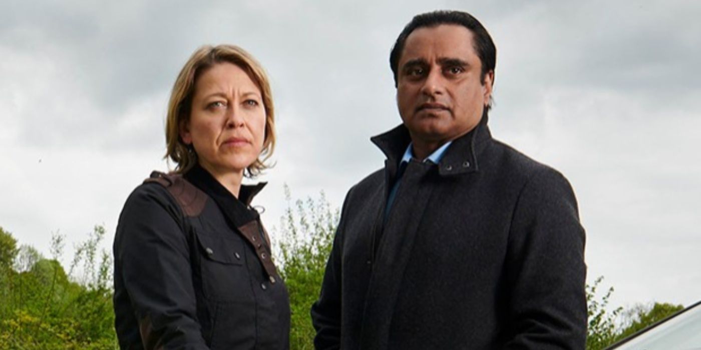 DCI Cassie Stuart and DI Sunil Khan stand next to each other in Unforgotten