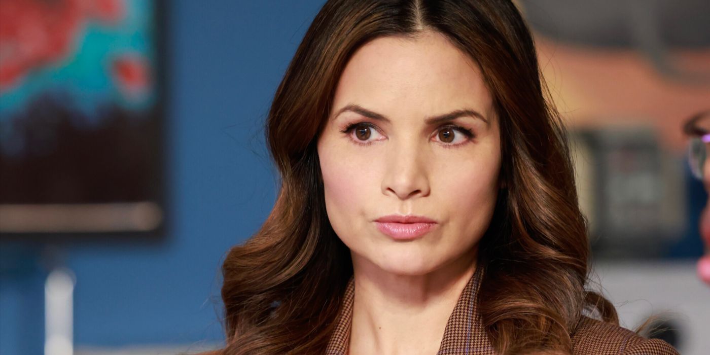 Jessica Knight (actor Katrina Law) looks ahead in a brown suit in NCIS Season 21