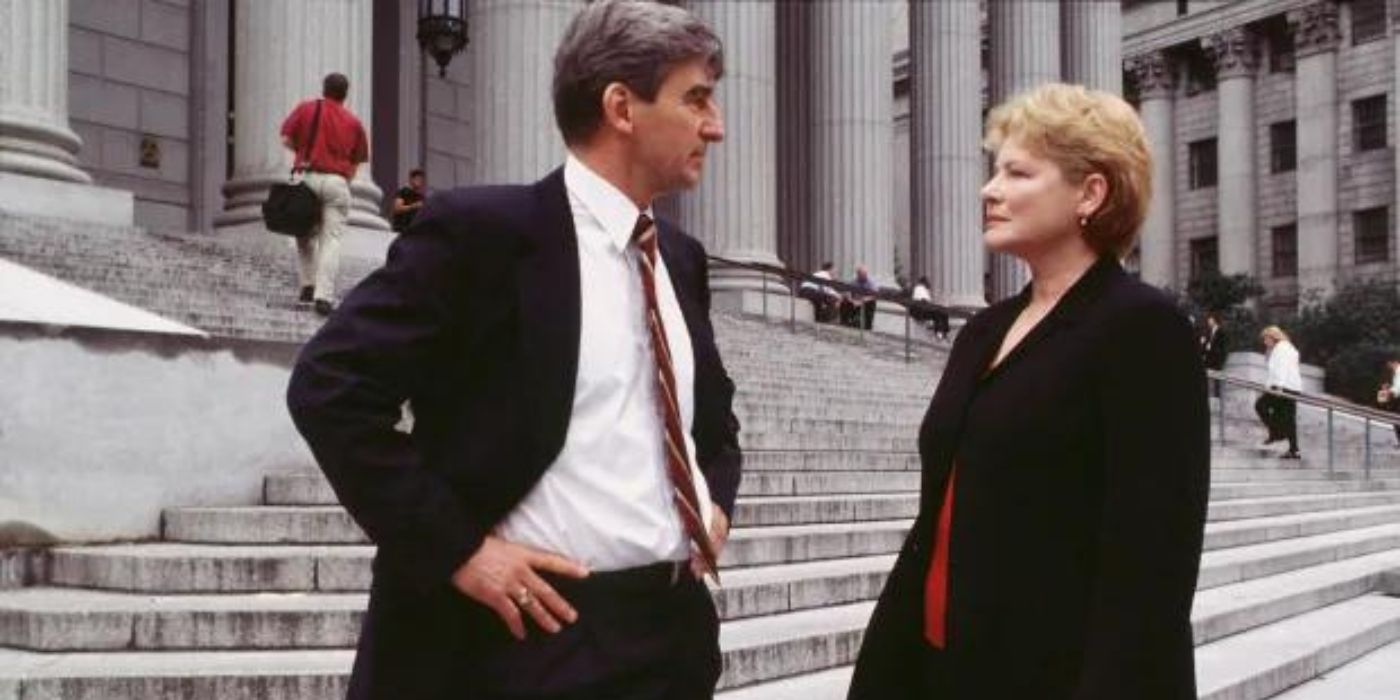 Sam Waterston as Jack McCoy talks outside the courthouse with Dianne Wiest as Nora Lewin on Law & Order