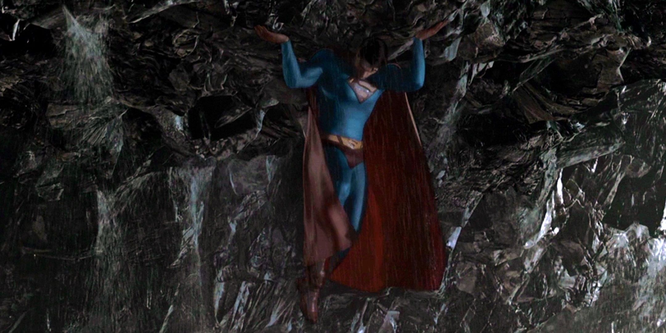 Superman lifting a Kryptonite Island