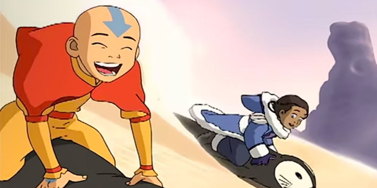 Aang e Katara andando de trenó com pinguins em Avatar: O Último Mestre do Ar.