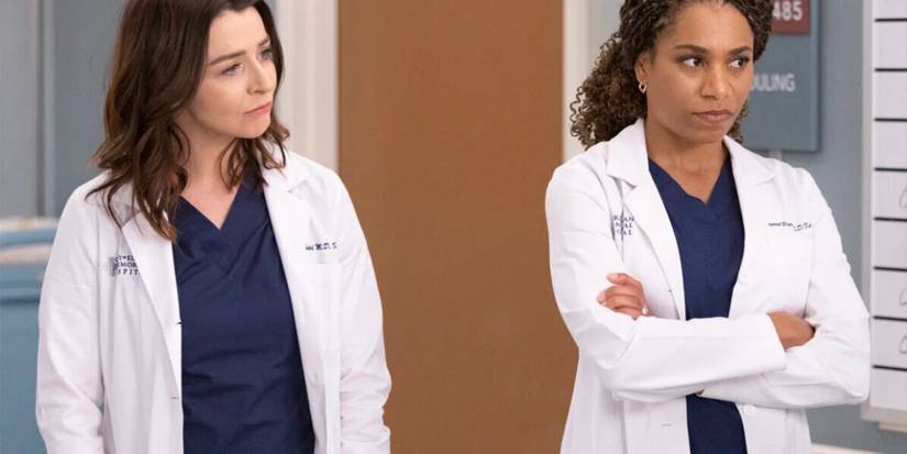 Dr. Amelia Shepherd and Dr. Maggie Pierce looking at someone at Grey-Sloan Memorial Hospital in Grey's Anatomy