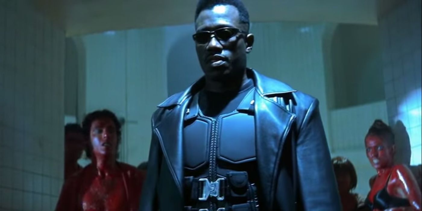 Blade surrounded by vampires in the "blood rave" scene of Blade.