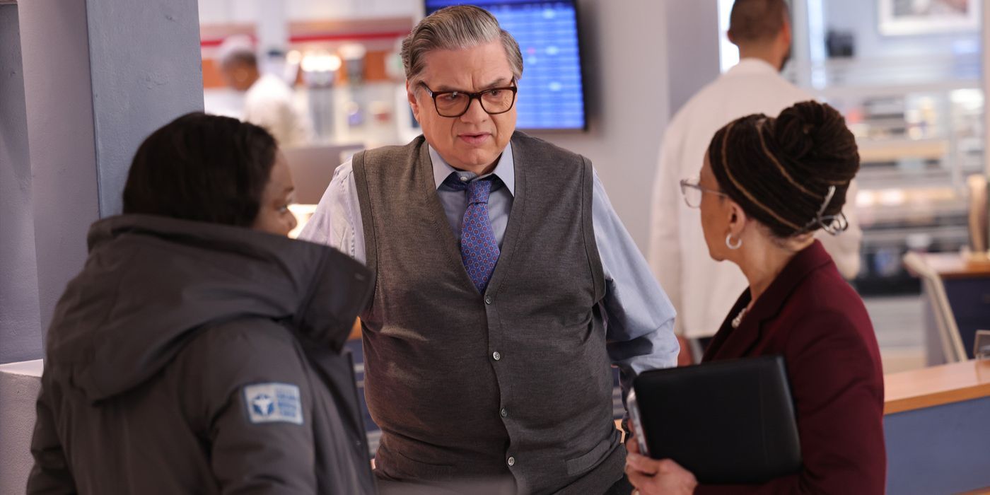 Charles (actor Oliver Platt) stands between Maggie and Goodwin in the ED on Chicago Med