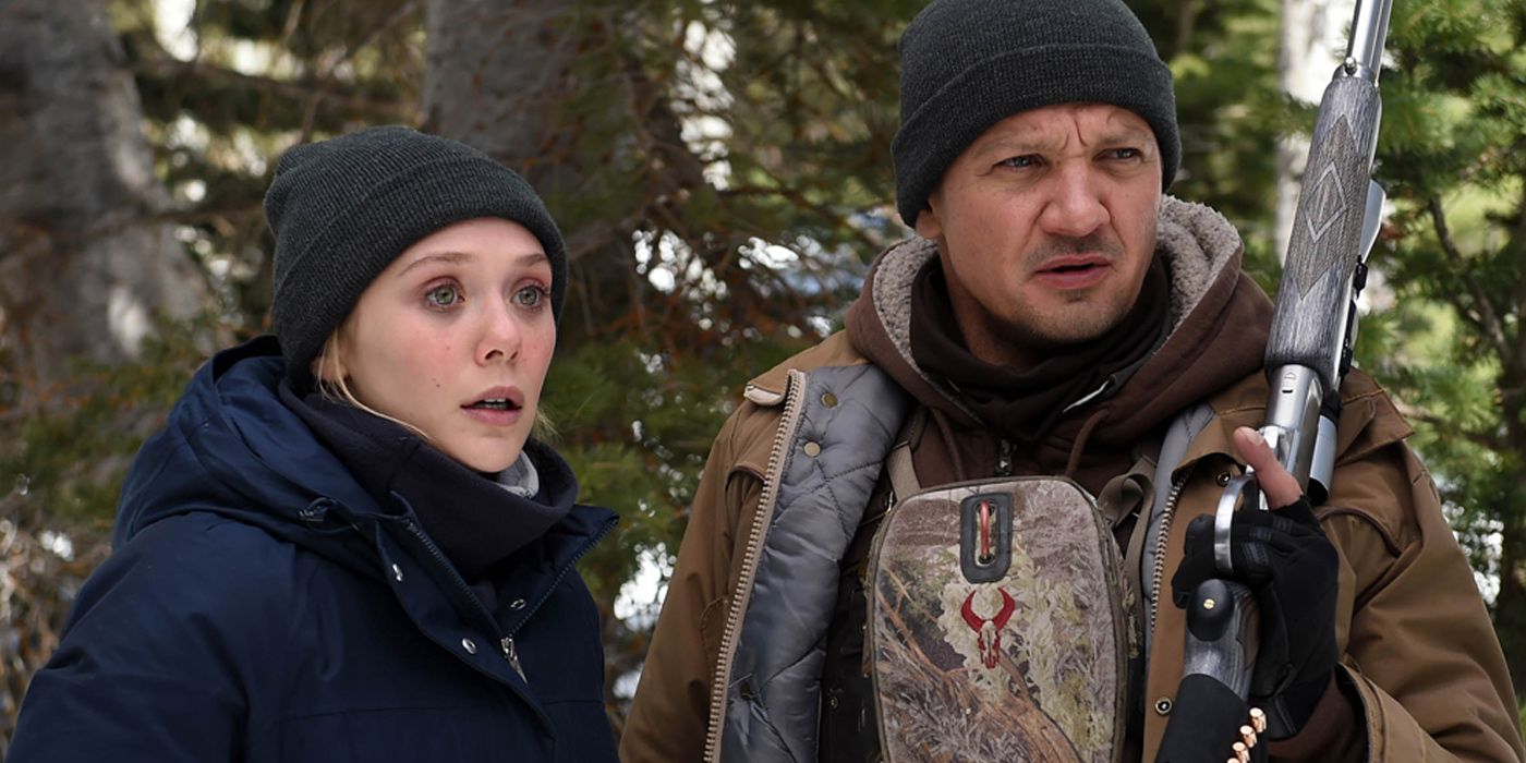 Jane and Cory look at the snowy horizon in Wind River