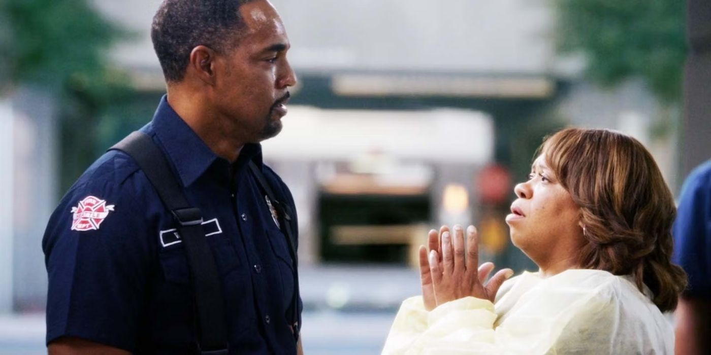 Jason George as Ben Warren looks upset as he talks to Chandra Wilson as Miranda Bailey on Station 19