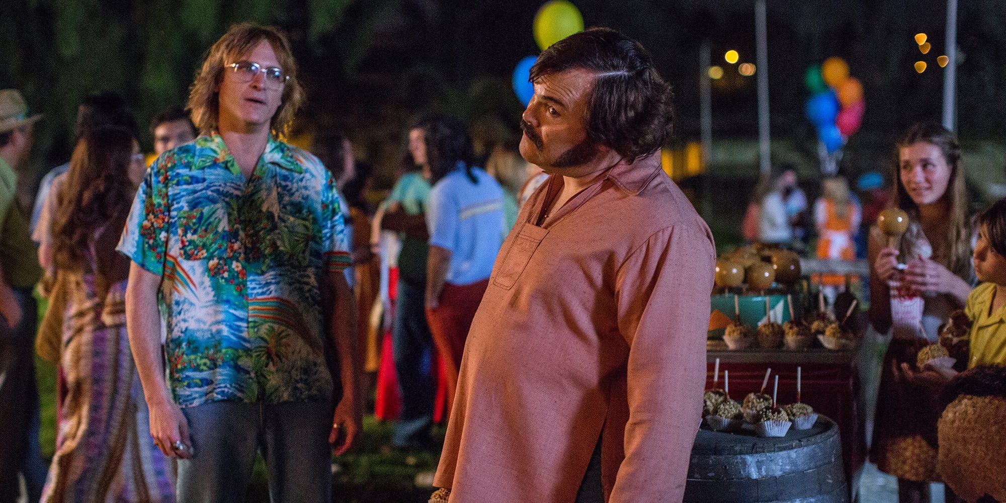 Joaquin Phoenix and Jack Black stand at a pool party in Don't Worry, He Won't Get Far on Foot