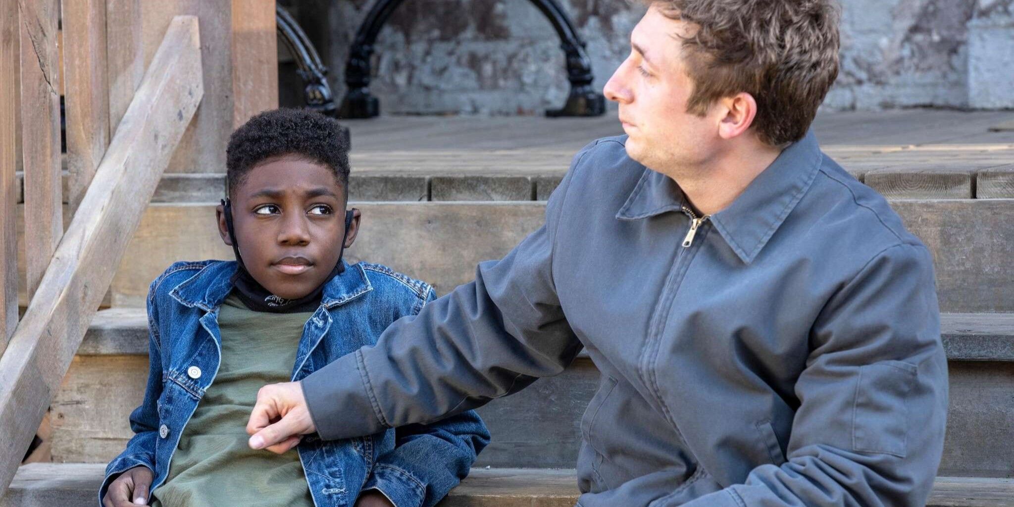 Liam sits with Lip on the stoop in Shameless