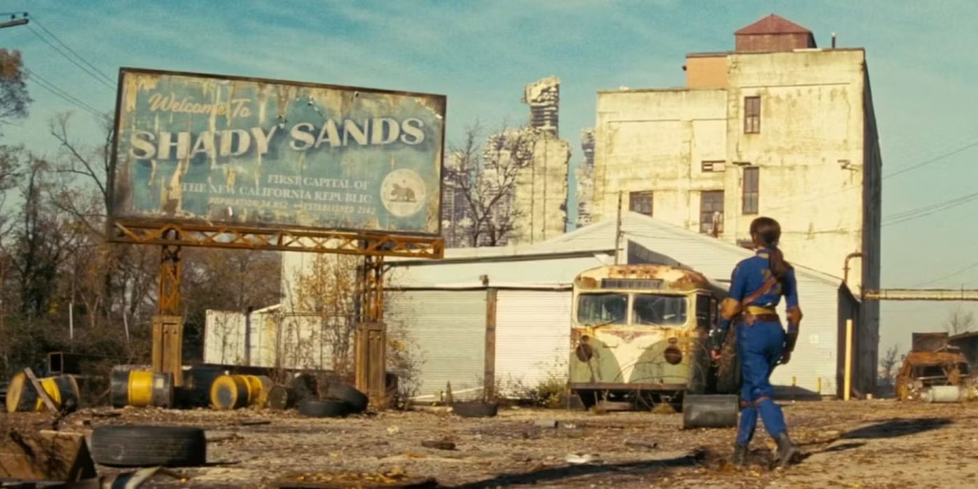 Lucy looks at Shady Sands' welcome sign in Fallout (2024)