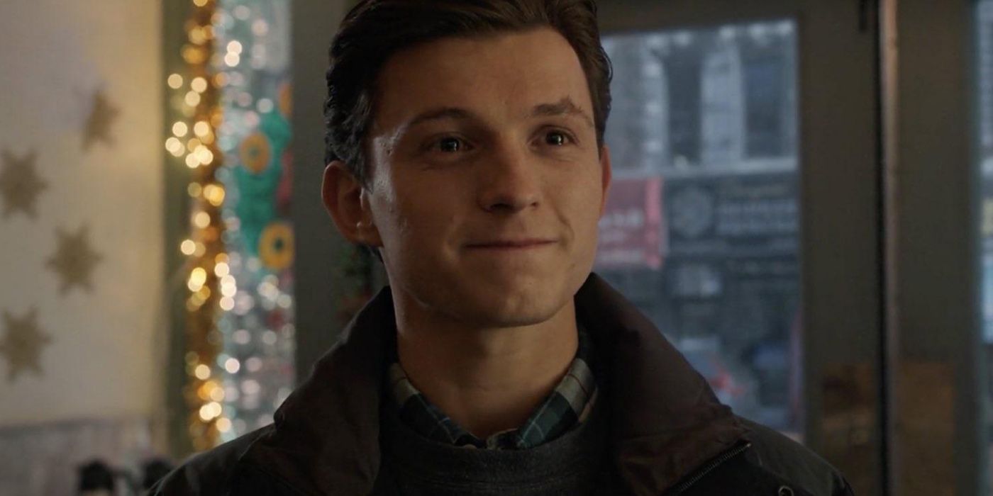 Peter Parker (Tom Holland) smiles after deciding to leave MJ and Ned alone in Spider-Man No Way Home