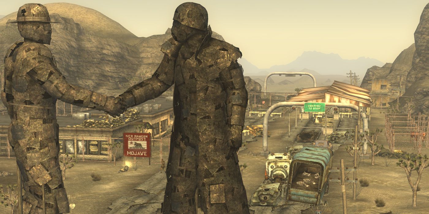 Statues of an NCR Trooper and Ranger shake hands in the Mojave Outpost in Fallout New Vegas