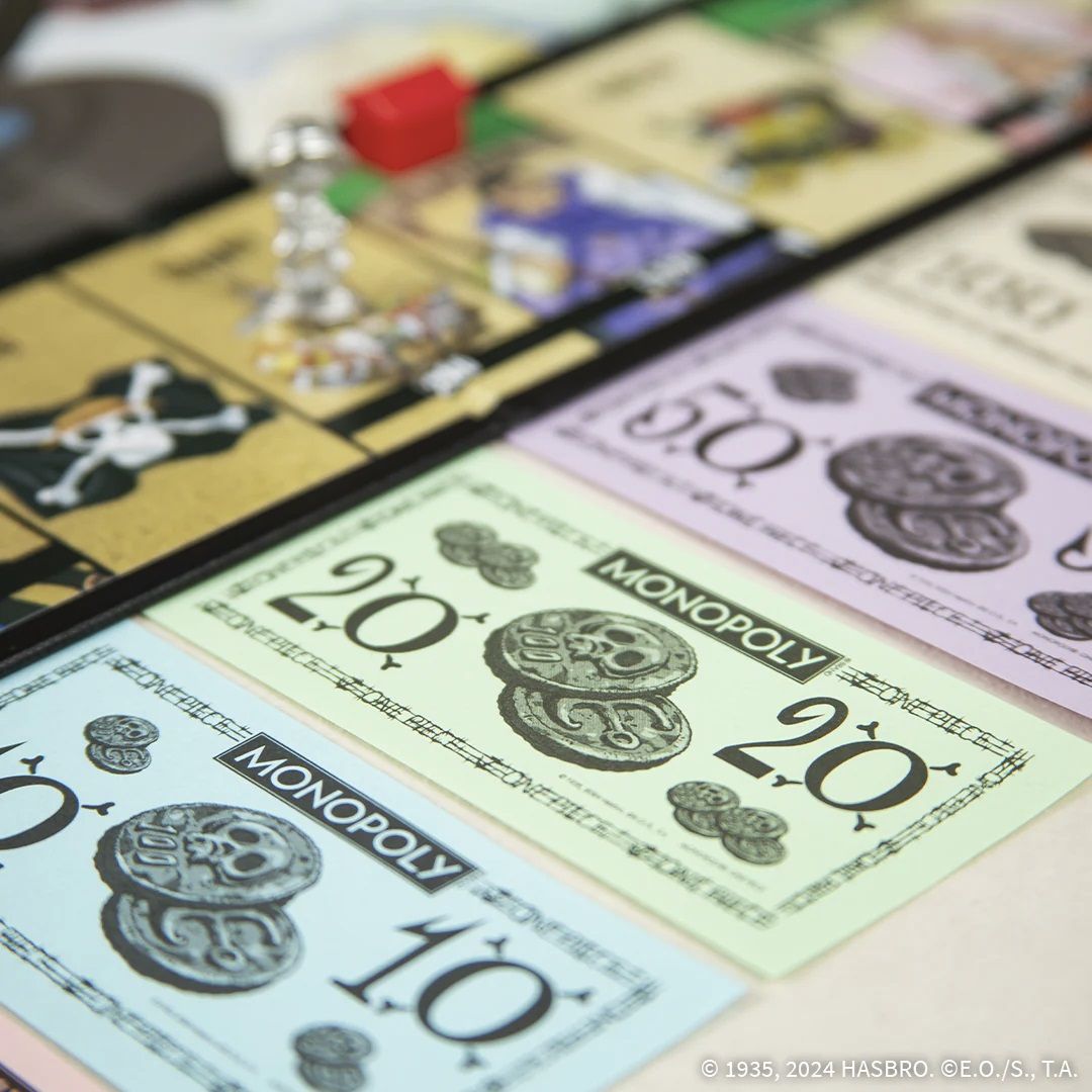 Official One Piece edition Monopoly showing money
