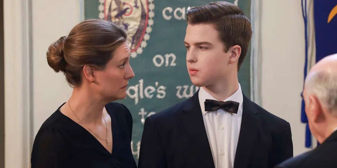 Mary Cooper (Zoe Perry) and Sheldon Cooper (Iain Armitage) wearing funeral attire on Young Sheldon