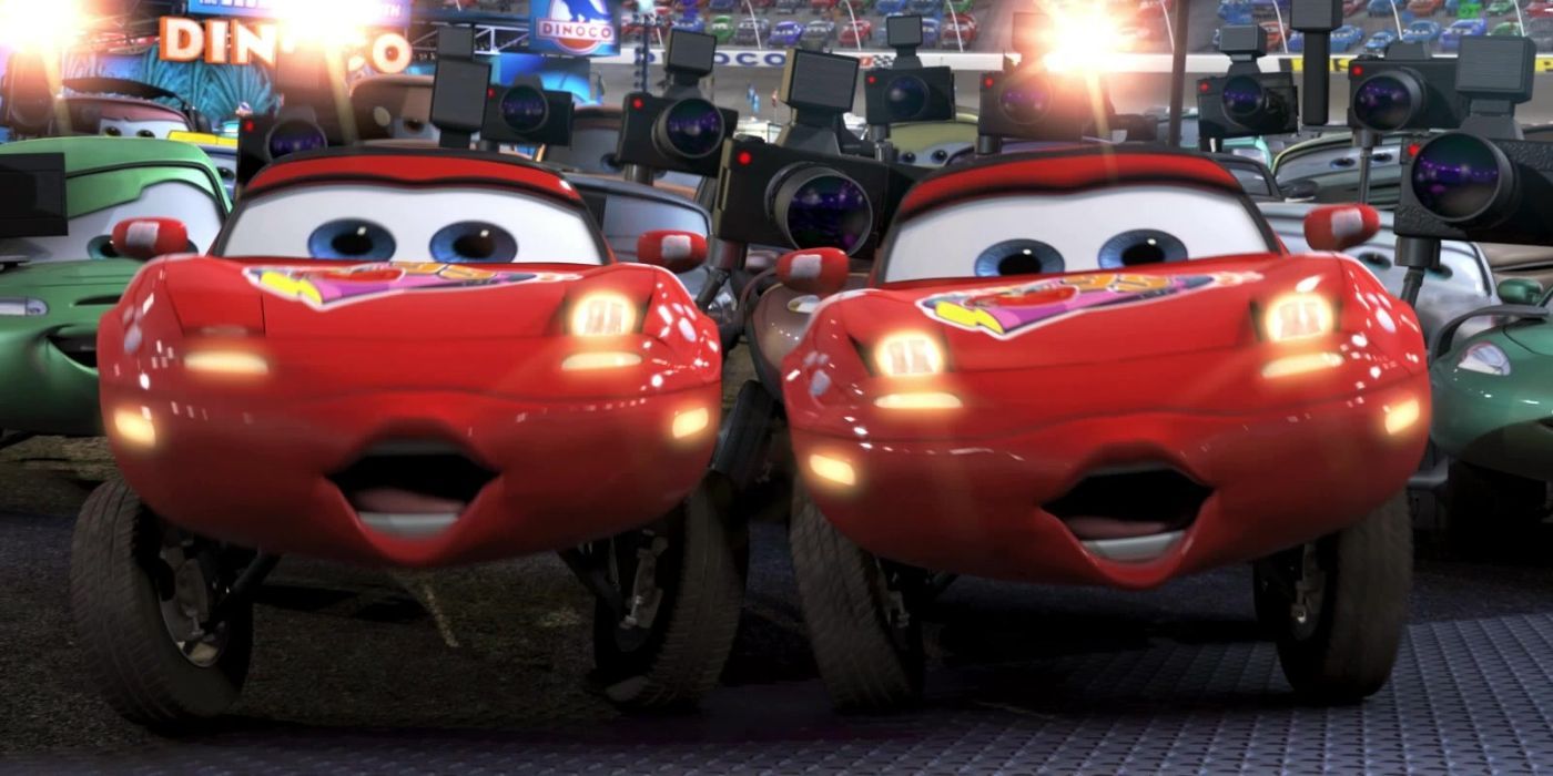 Mia and Tia show Lightning McQueen their headlights at a press conference. 