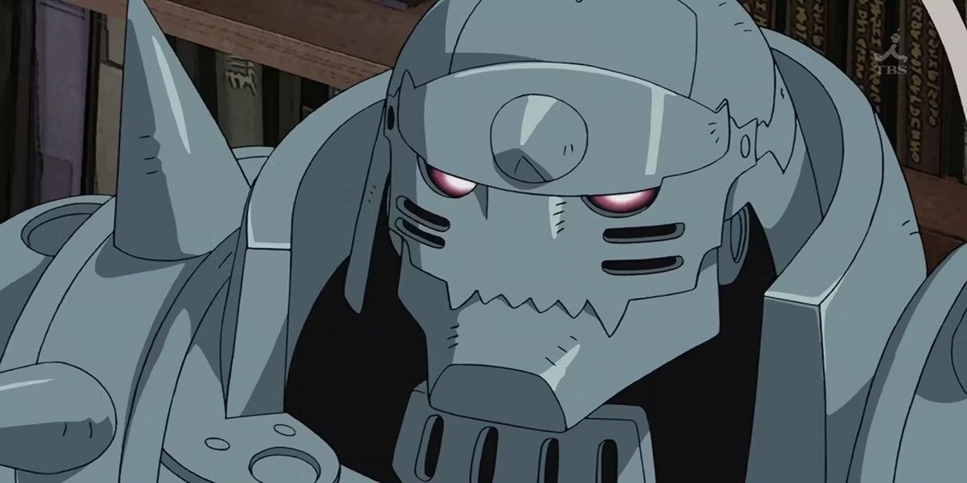 alphonse elric in the library with a shelf behind him.