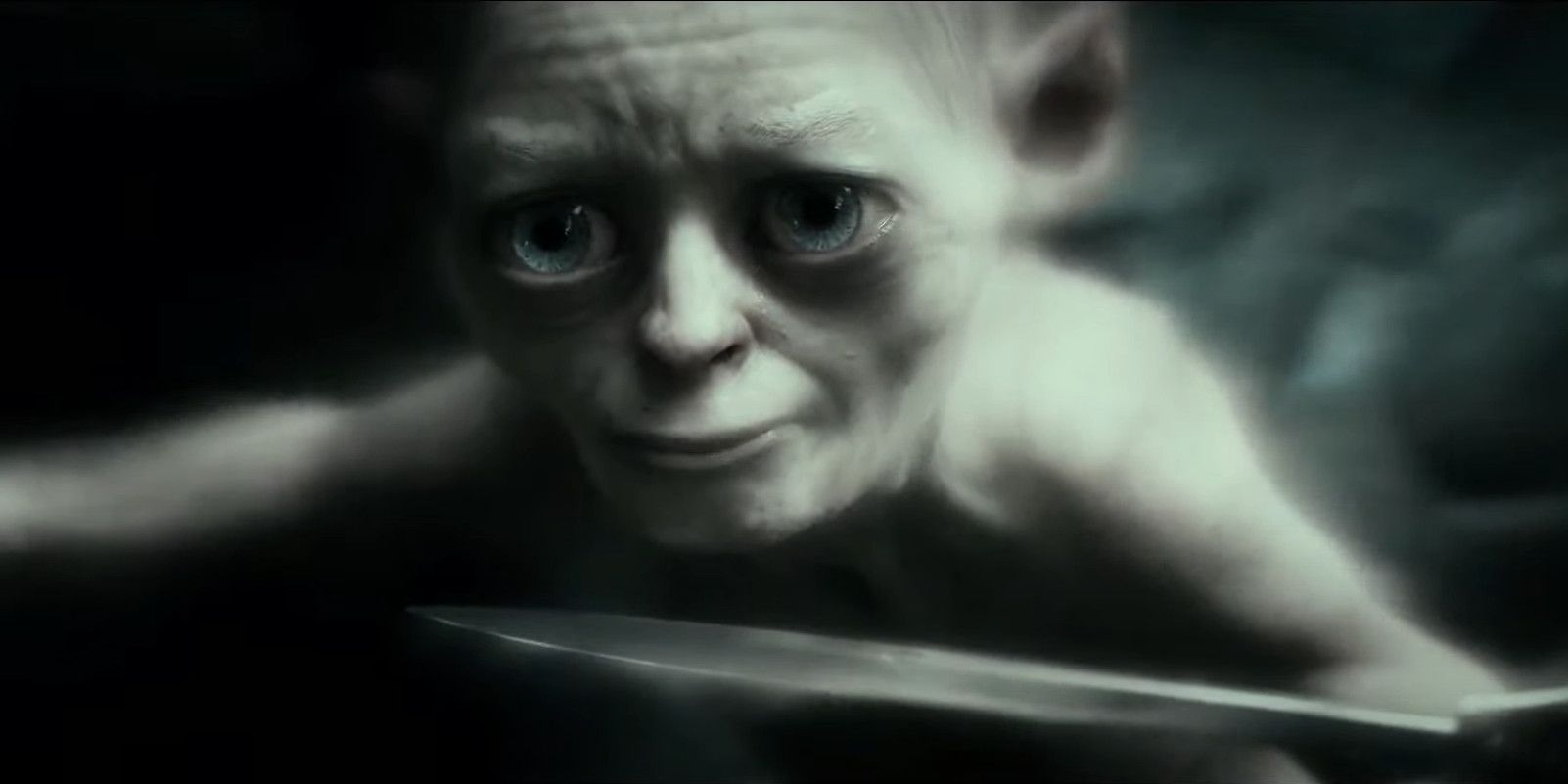 Bilbo threatens Gollum (who can't seem him) with Sting in The Hobbit: An Unexpected Journey