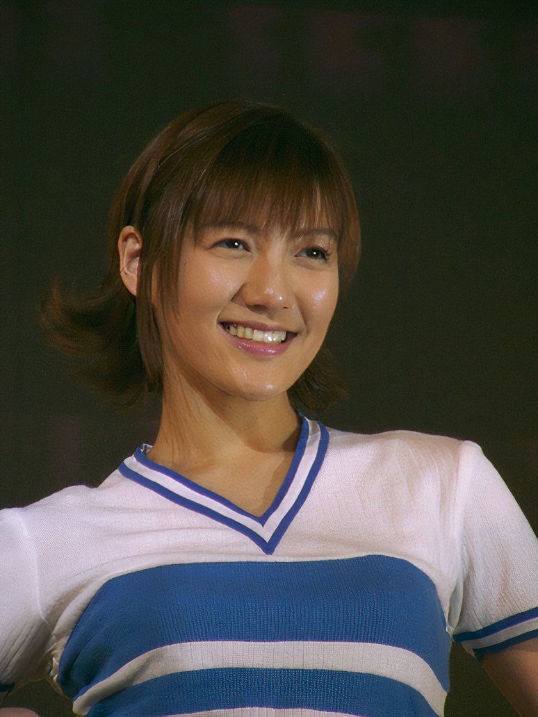 Chiaki Inaba is smiling while cosplaying as Nami from One Piece.