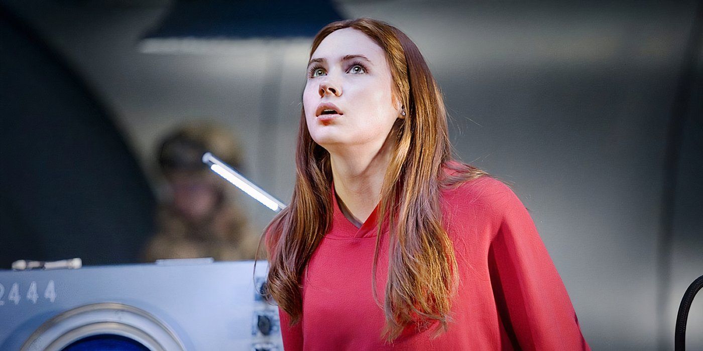 Amy Pond looks up in fear