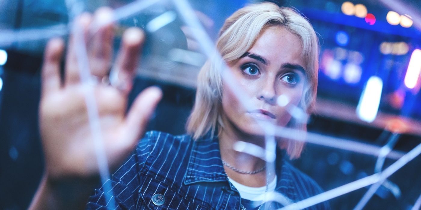 Ruby Sunday (actor Millie Gibson) holds her hand up to cracked glass in Doctor Who