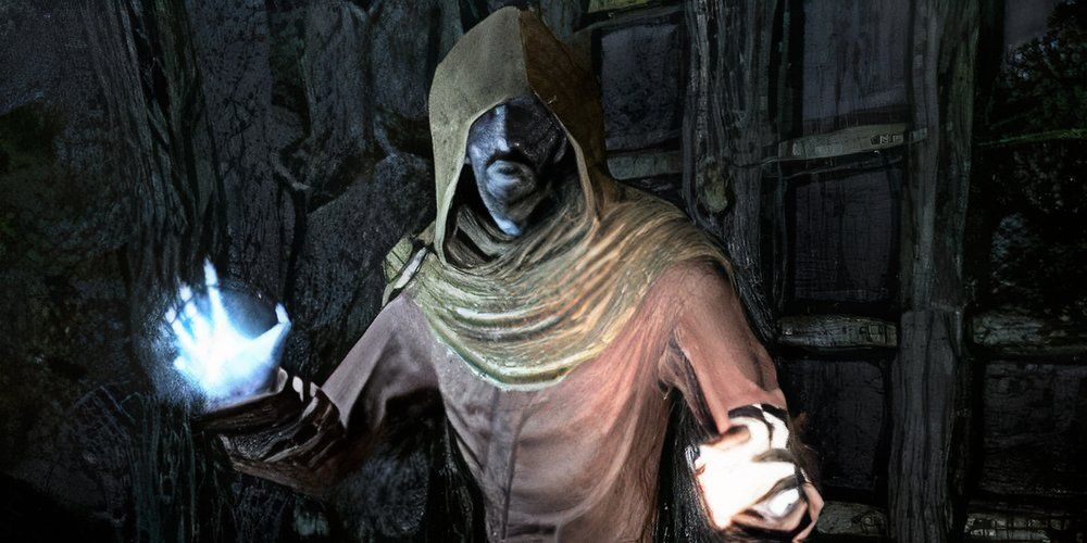 Erandur from Elder Scrolls V: Skyrim is casting two spells.