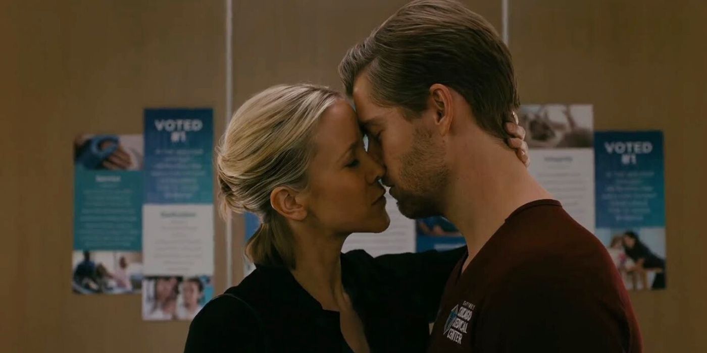 Jessy Schram as Hannah Asher kisses Luke Mitchell as Mitch Ripley in an elevator on Chicago Med