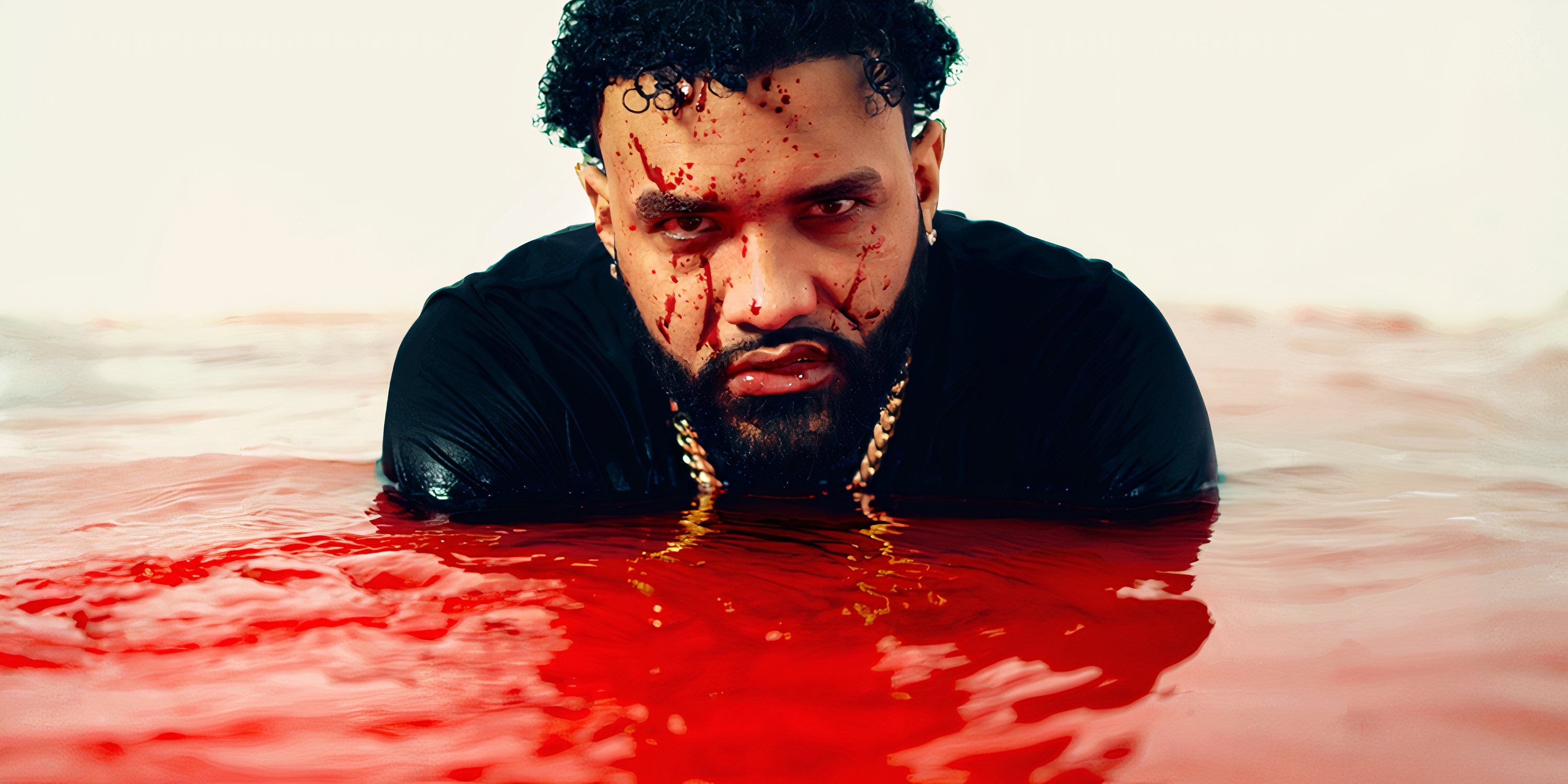 Joyner Lucas covered in blood whilst in water