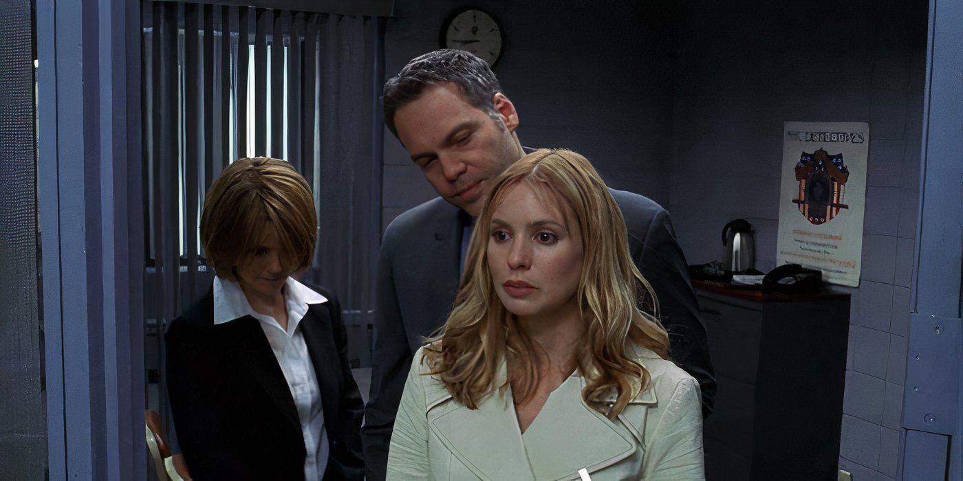 Detectives Goren (Vincent D'Onofrio) and Eames (Kathryn Erbe) arresting Nicole Wallace (Olivia D'Abo) in Law and Order: Criminal Intent episode "Anti-Thesis"