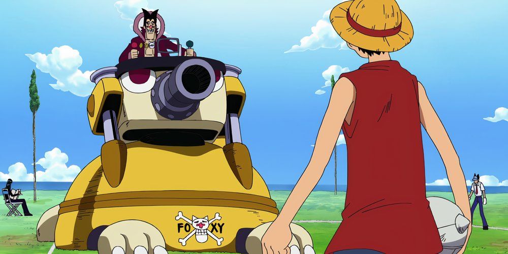 Luffy olhando para Foxy na máquina de queimada durante a segunda rodada de lutas de Davy Back no Arco Long Rong Long Land de One Piece.