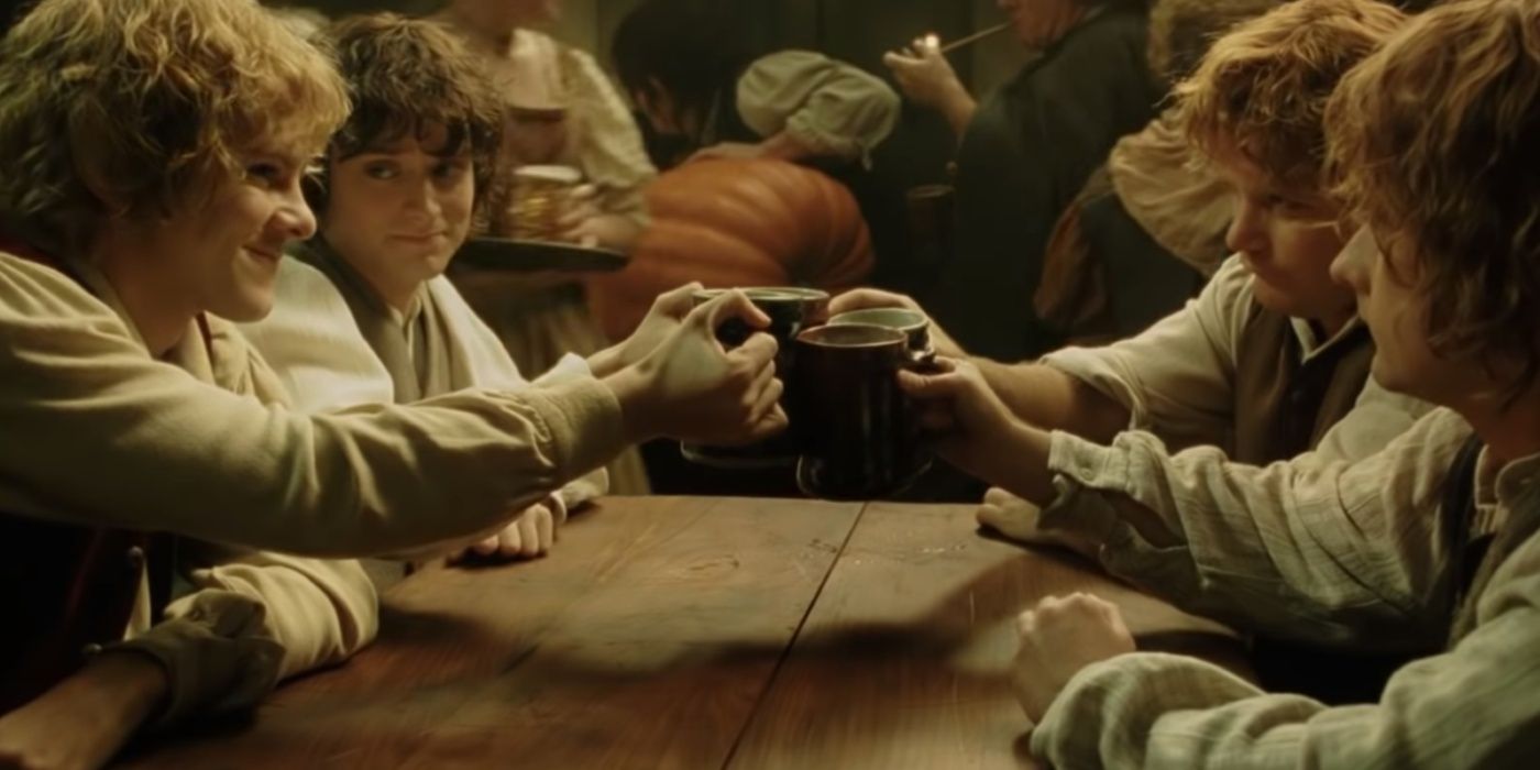 Frodo, Sam, Merry e Pippin no Dragão Verde em O Senhor dos Anéis