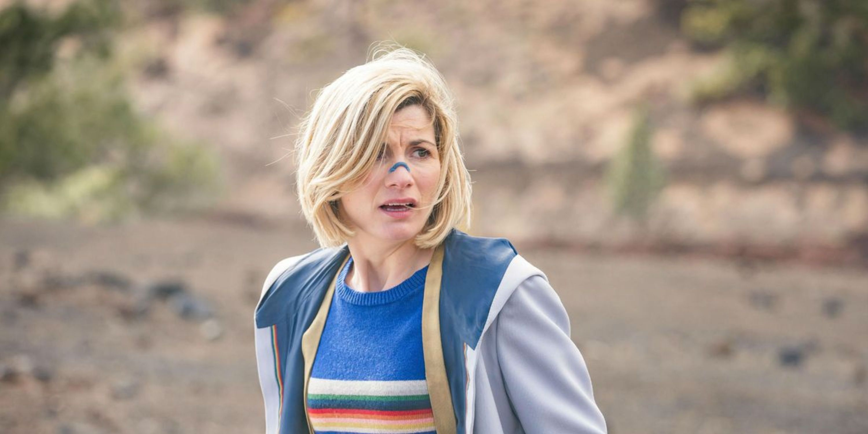 Jodie Whittaker worriedly looks off-screen as the Thirteenth Doctor in Doctor Who