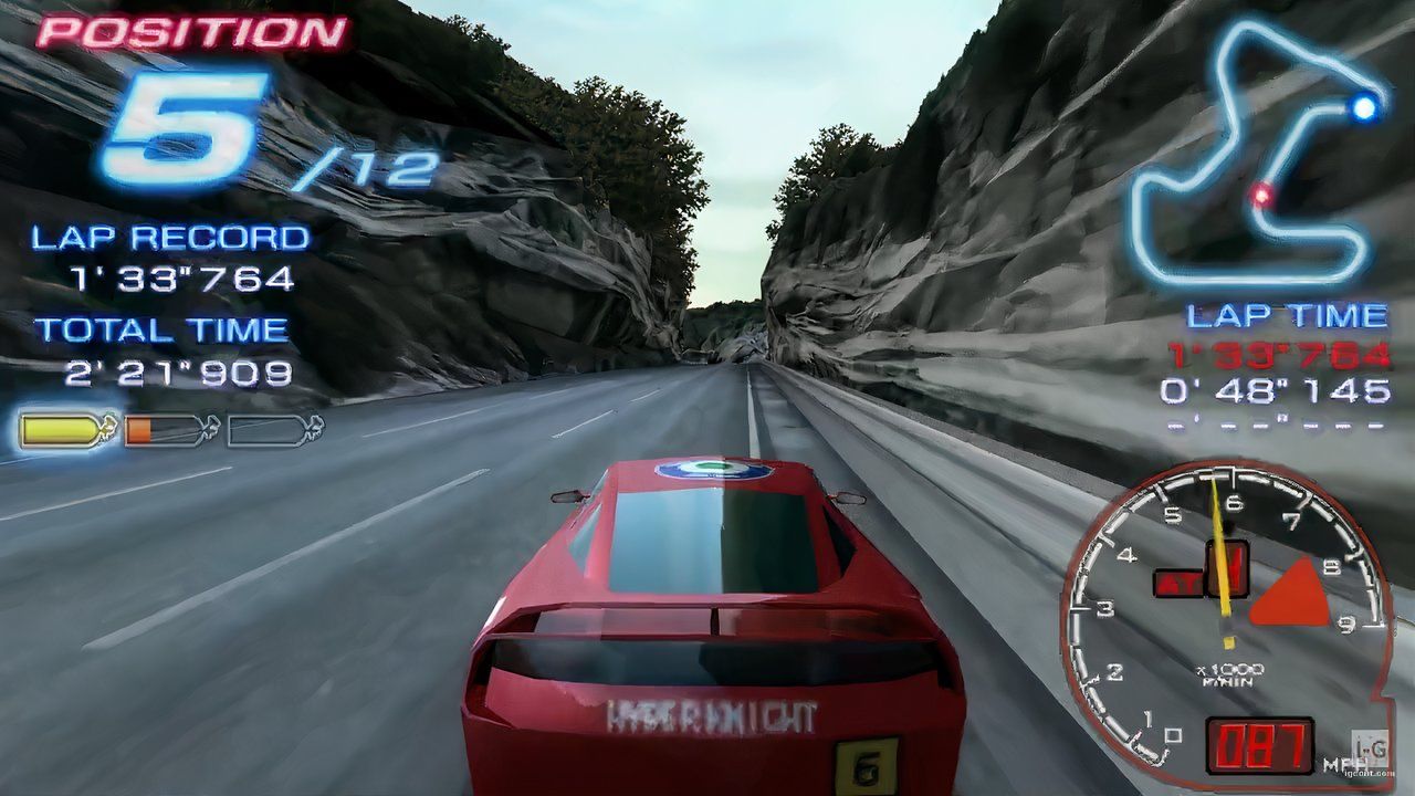 red car racing on a street in Ridge Racer