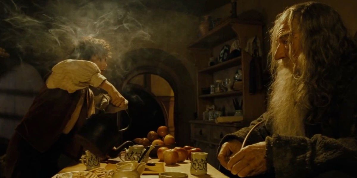 Frodo preparing tea for Gandalf in LOTR