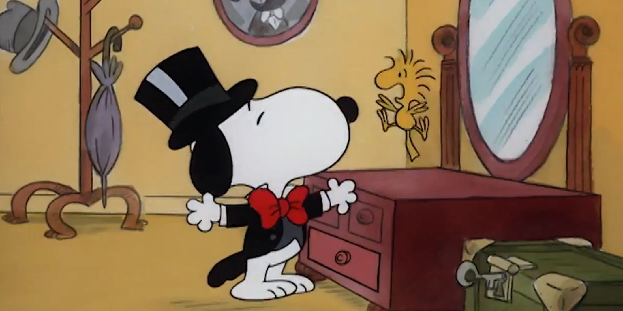 Snoopy wearing a tuxedo and top hat