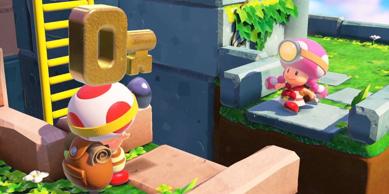 Toad se prepara para arrojarle una llave sobre un agujero a Toadette en Captain Toad Treasure Tracker
