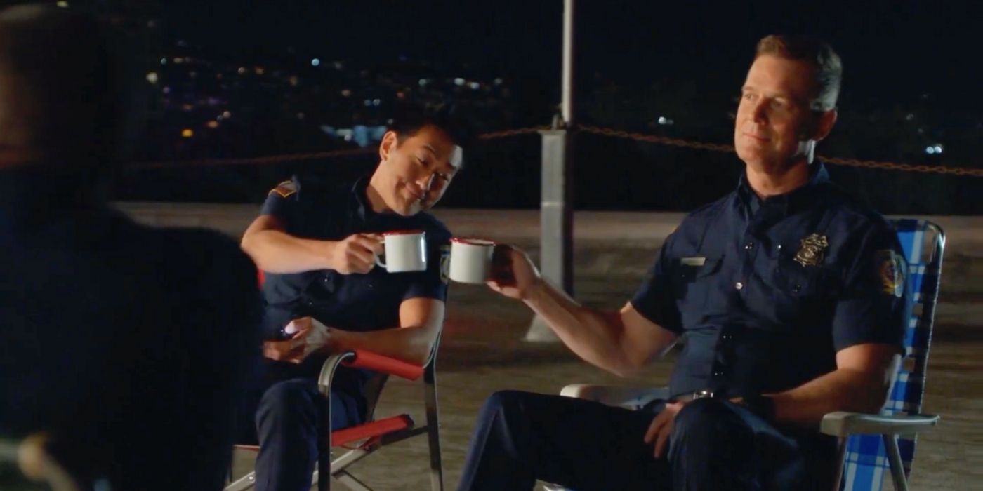 Kenneth Choi as Howard 'Chimney' Han toasts Peter Krause as Bobby Nash on 9-1-1