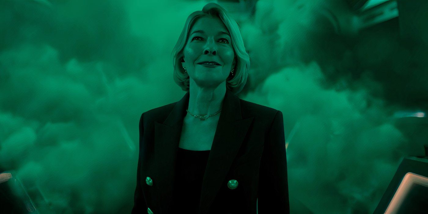 Kate Stewart smiles sadly as green smoke overtakes her