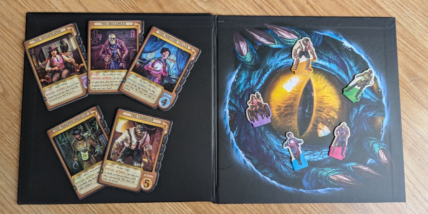 Cartas y piezas de héroe de World of Horrified Monsters